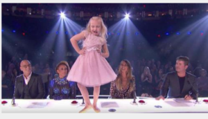 A young boy and girl sing "Footloose" in a way that blows the judges' minds.